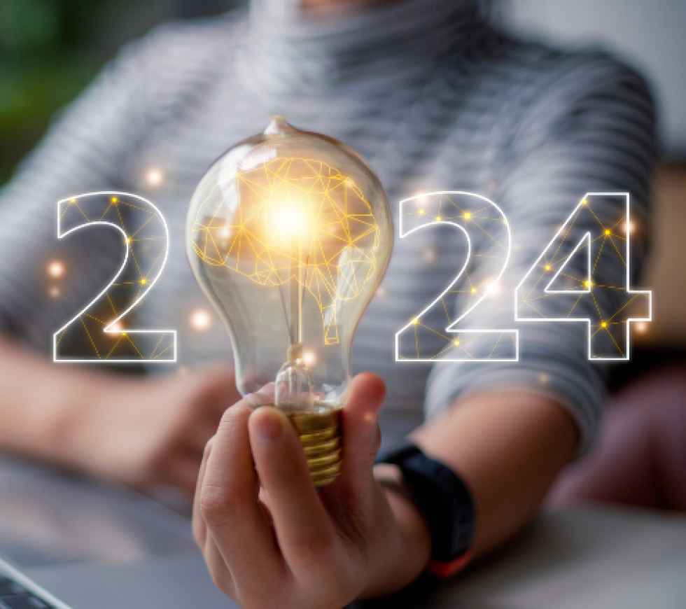 The year 2024 displayed and the zero is represented by a lightbulb. 