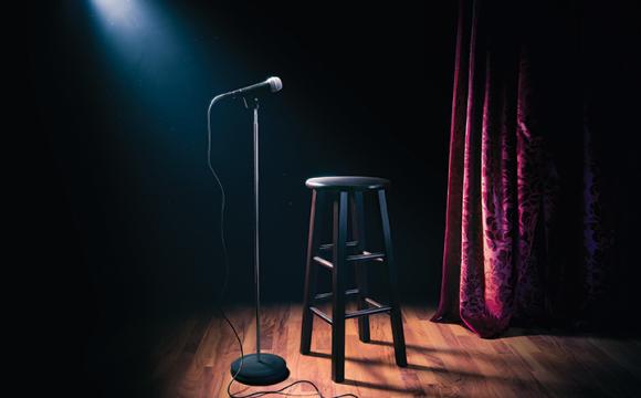 microphone with stool on a stage